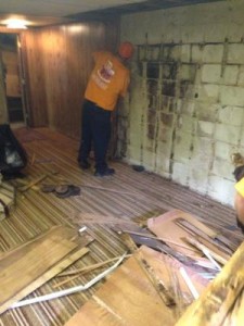 Water Damage Tillamook Technician Working on Moldy Wall Repair